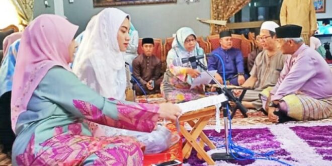 ernie juliana berkerudung putih wanita cantik suku dusun yang 201009224111 515