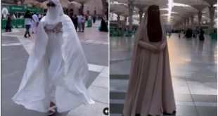 Isa Zega mengenakan busana muslim dan cadar saat berada di Masjid Nabawi