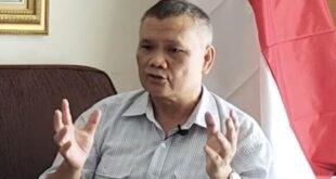 Dr Emrus Sihombing MSi