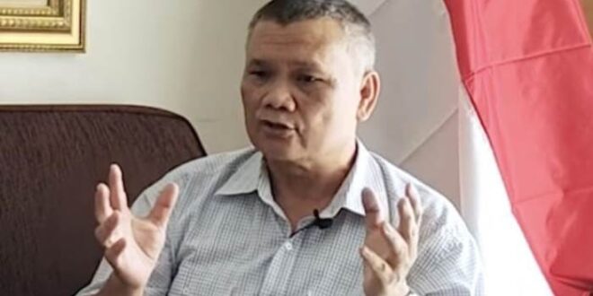 Dr Emrus Sihombing MSi